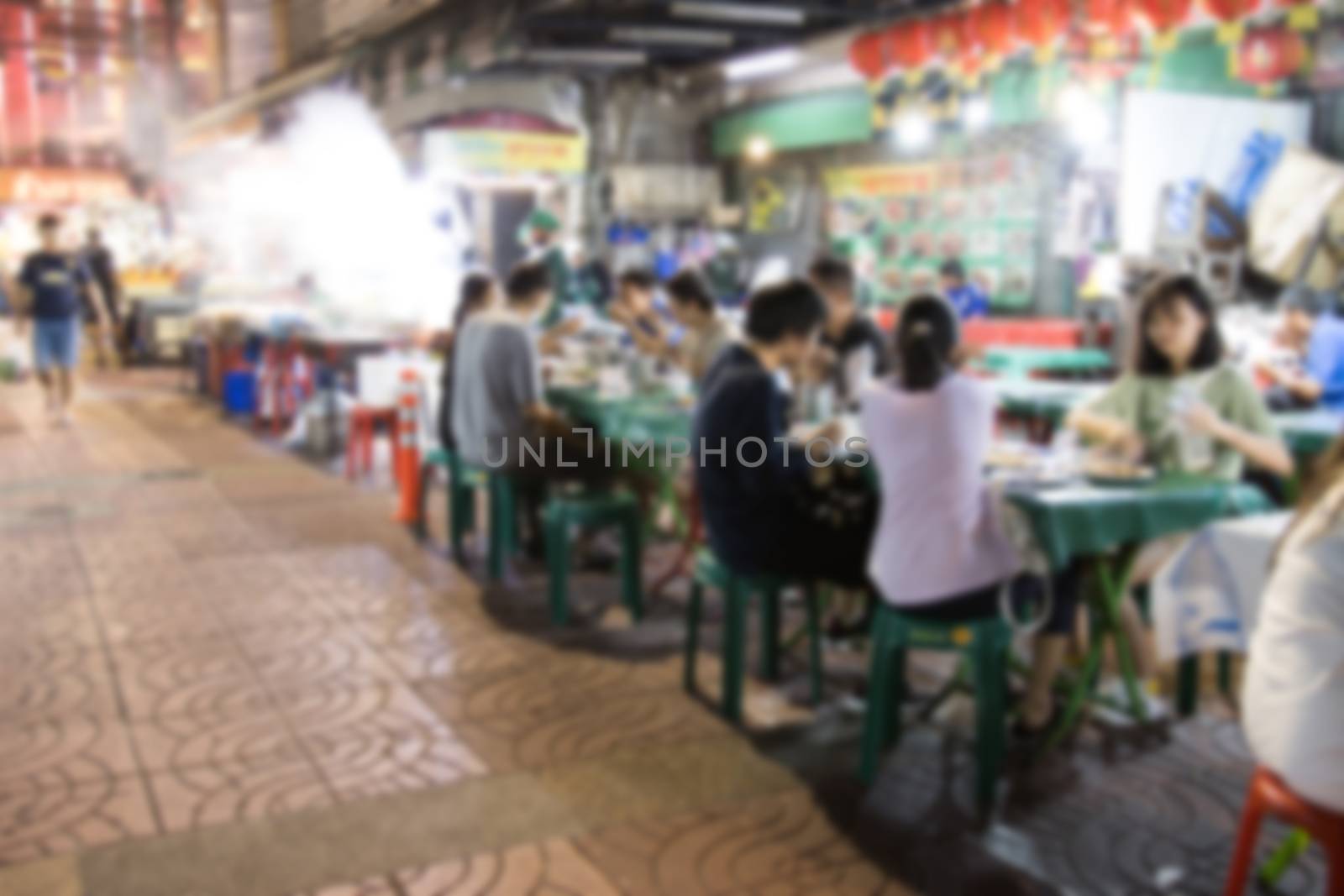 blurred image Street food in Chinatown Bangkok Thailand and people high concentration of them in busy areas