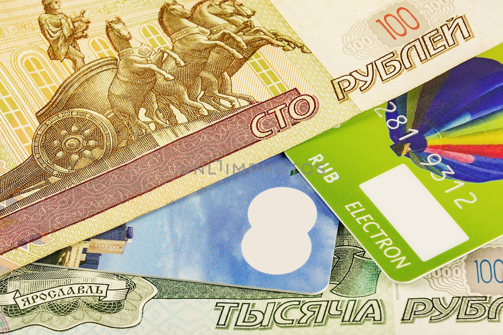 Part of the bank card and a part of Russian rubles banknotes by Grommik