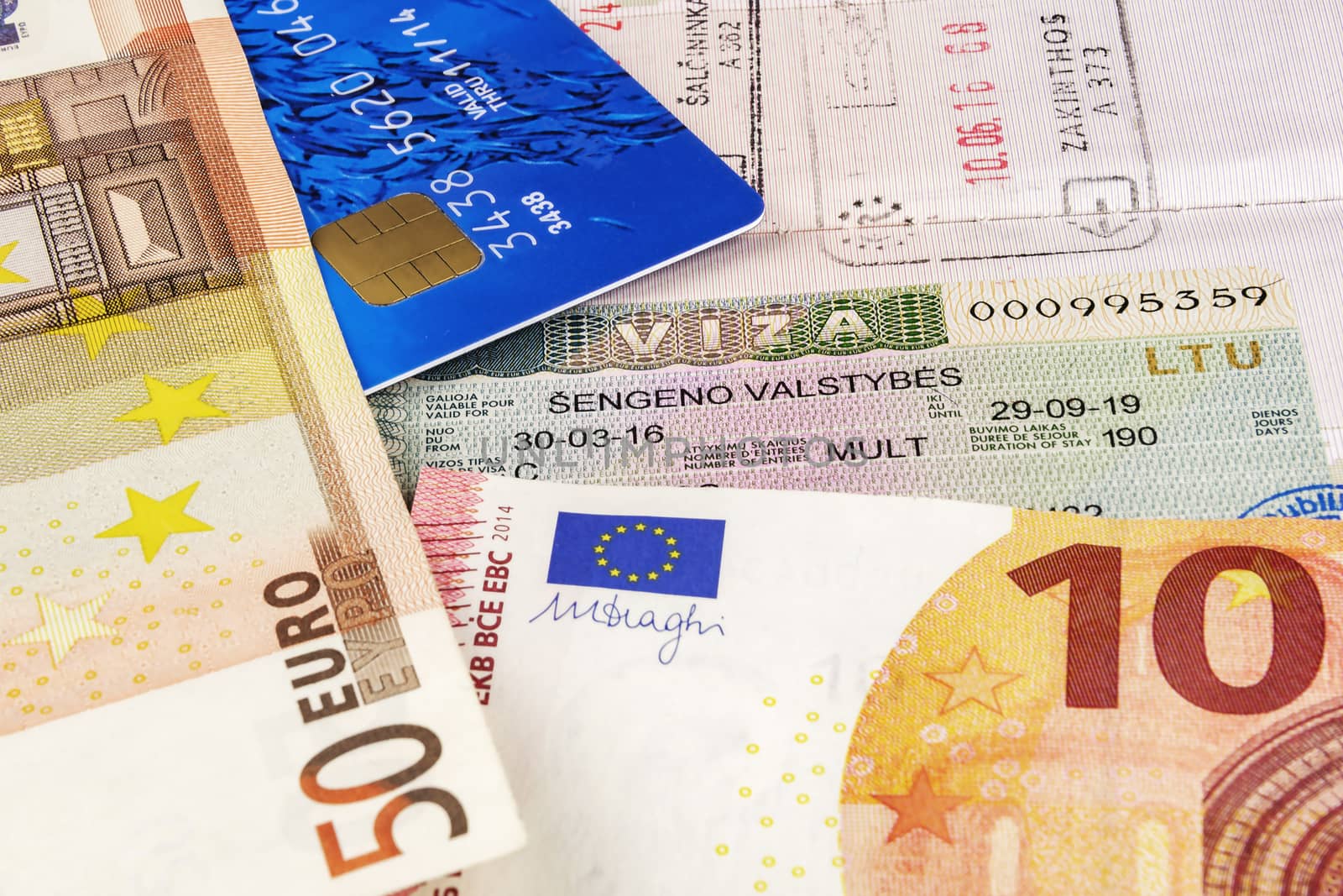 In the Schengen visa in the passport are banknotes and bank card