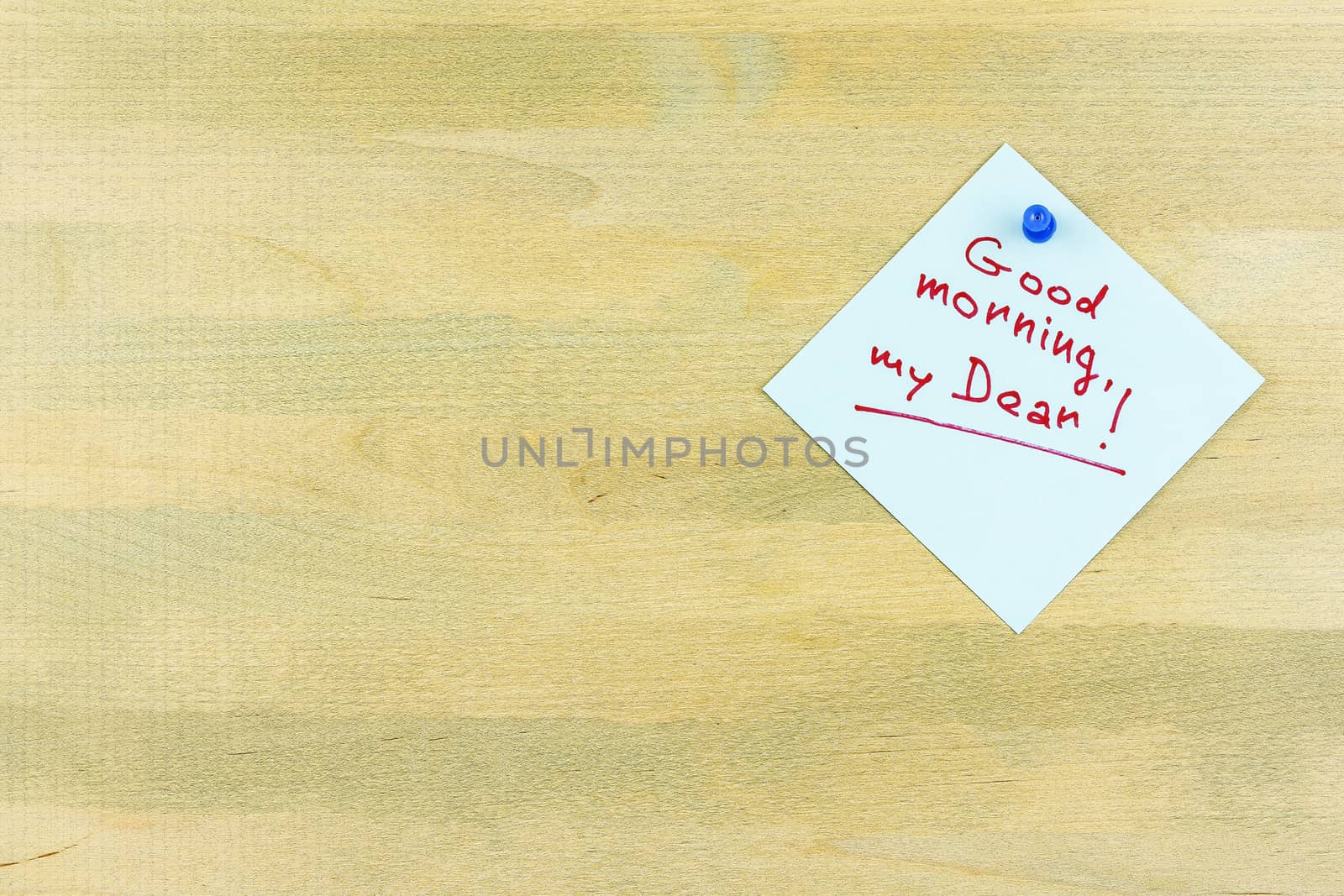 By the wooden surface is attached a sheet of plain button with the words "Good morning, my dear"