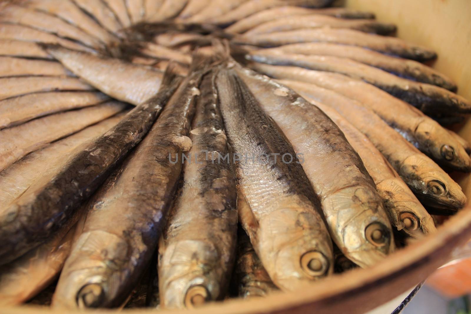Salted fish products for sale at a market stall in Spain