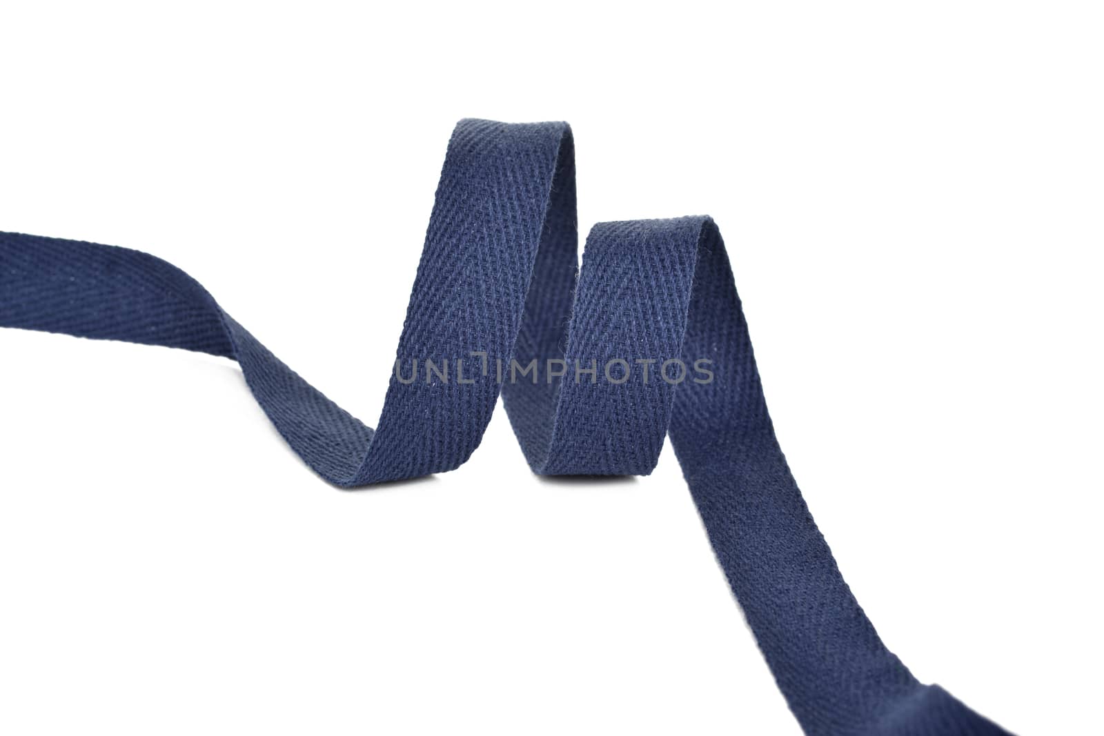 blue Twisted ribbon of cotton Keeper braid on white background. Tape For sewing clothes.