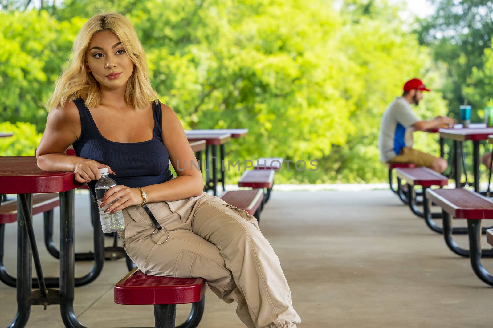 A gorgeous young blonde model enjoys a day outdoors while maintaining a safe distance from others during the Covid-19 pandemic