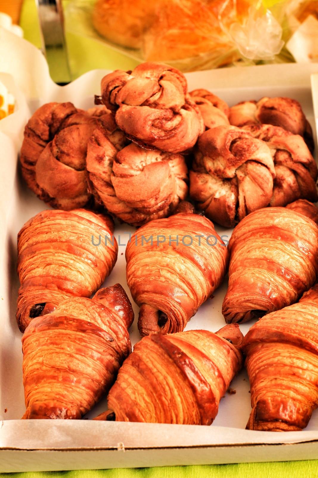 Croissants for sale at an eco-friendly flea market by soniabonet