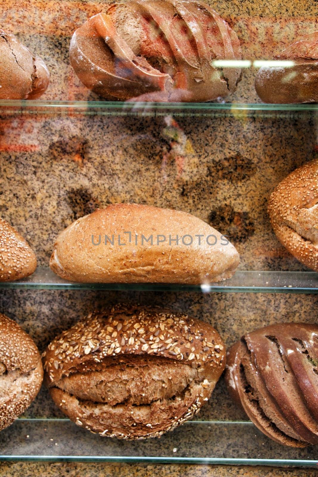 Loaves of bread in a showcase by soniabonet