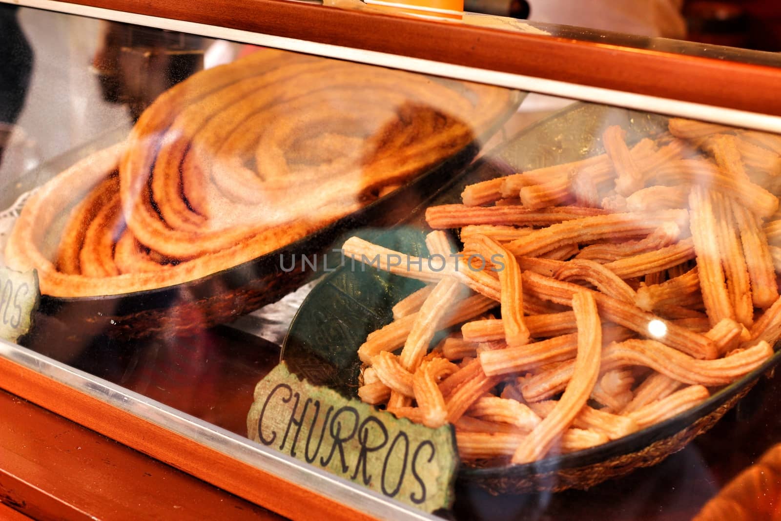 Churros for sale in a street stall in Spain by soniabonet