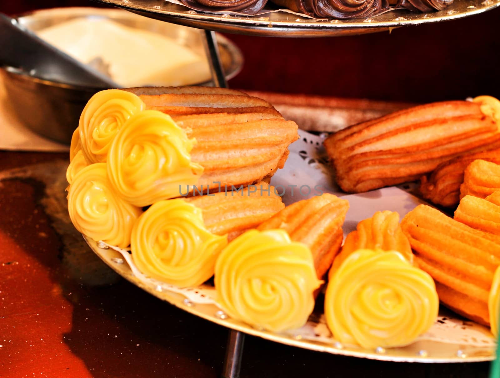 Churros for sale in a street stall in Spain by soniabonet