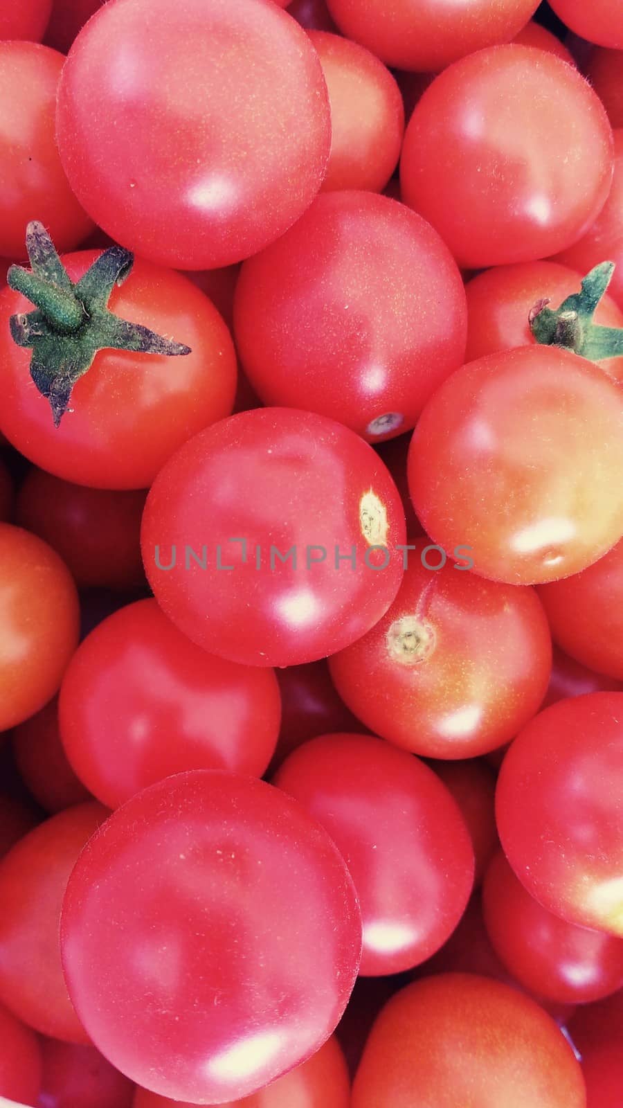 Red tomatoes background by soniabonet