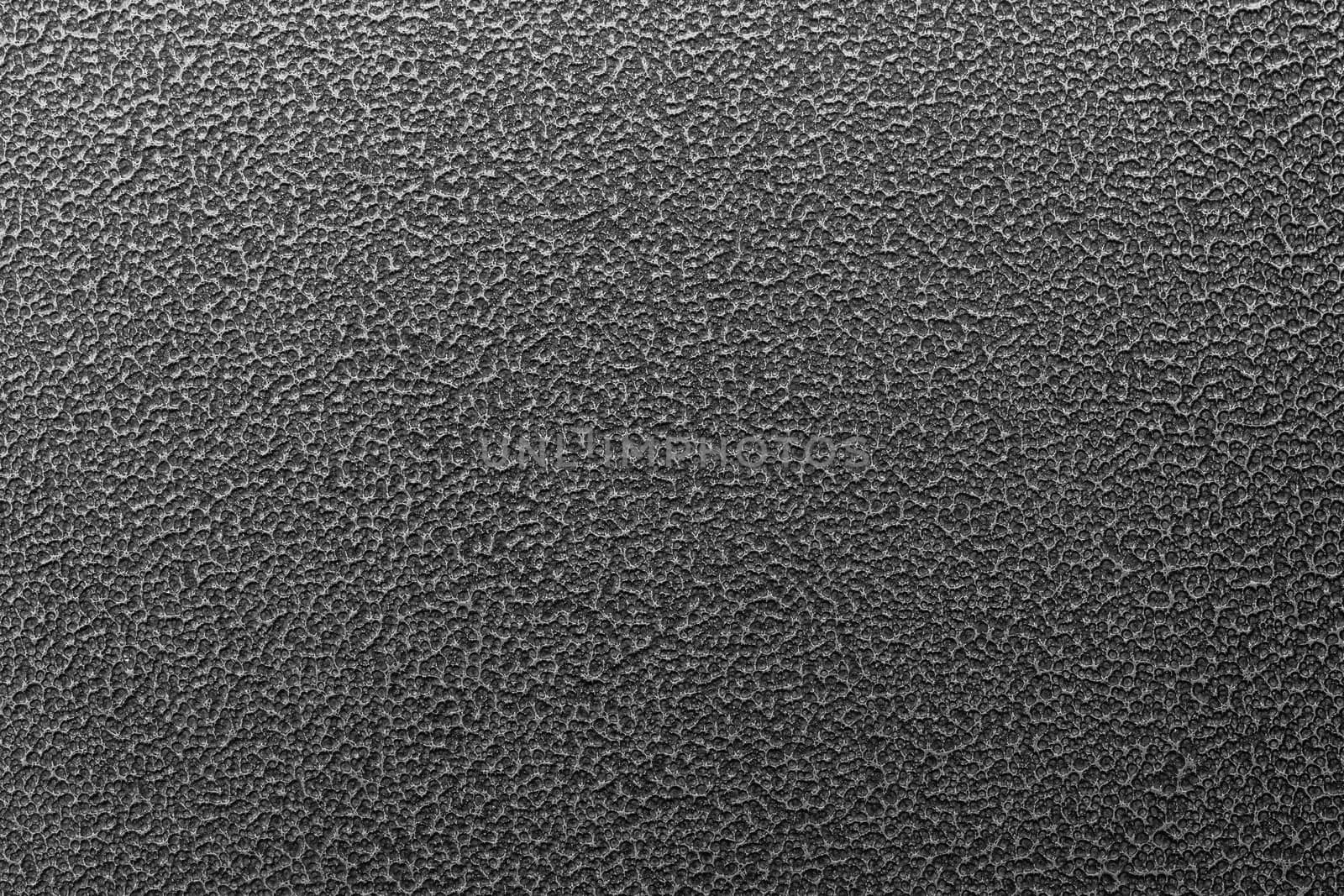 Texture and full frame background of hammered powder paint coating on flat sheet steel surface. Also known as hammertone effect.