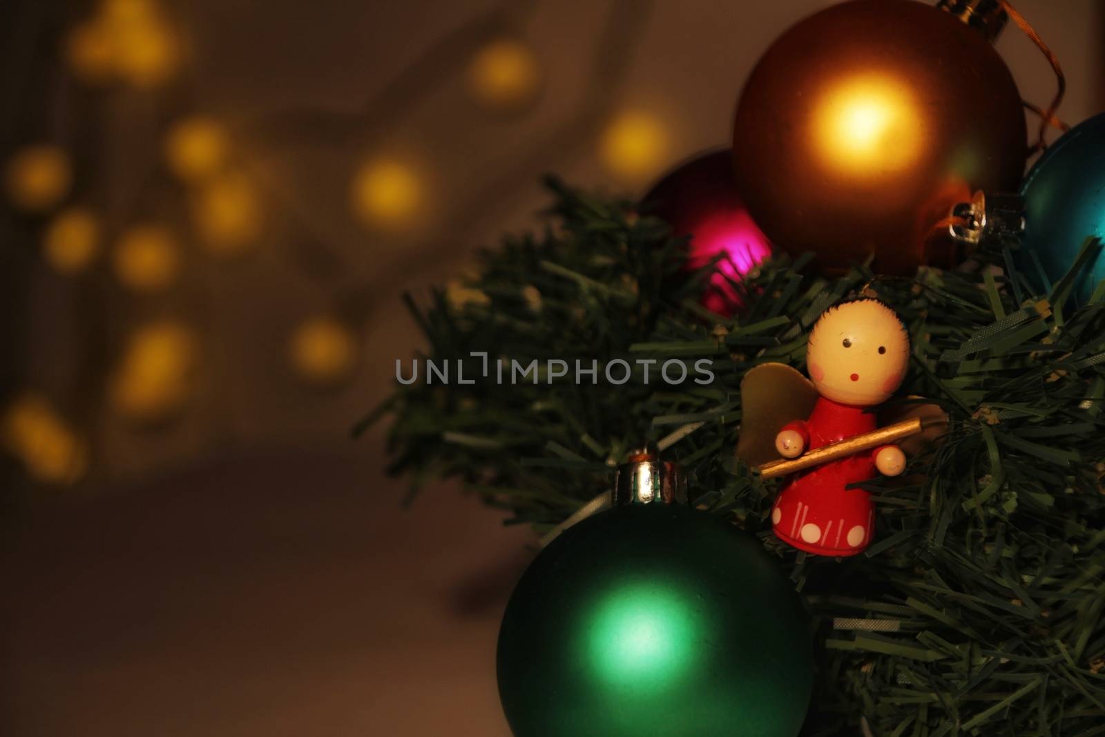 Angel Christmas ornament, Christmas tree balls, garlands and other colorful decorative elements