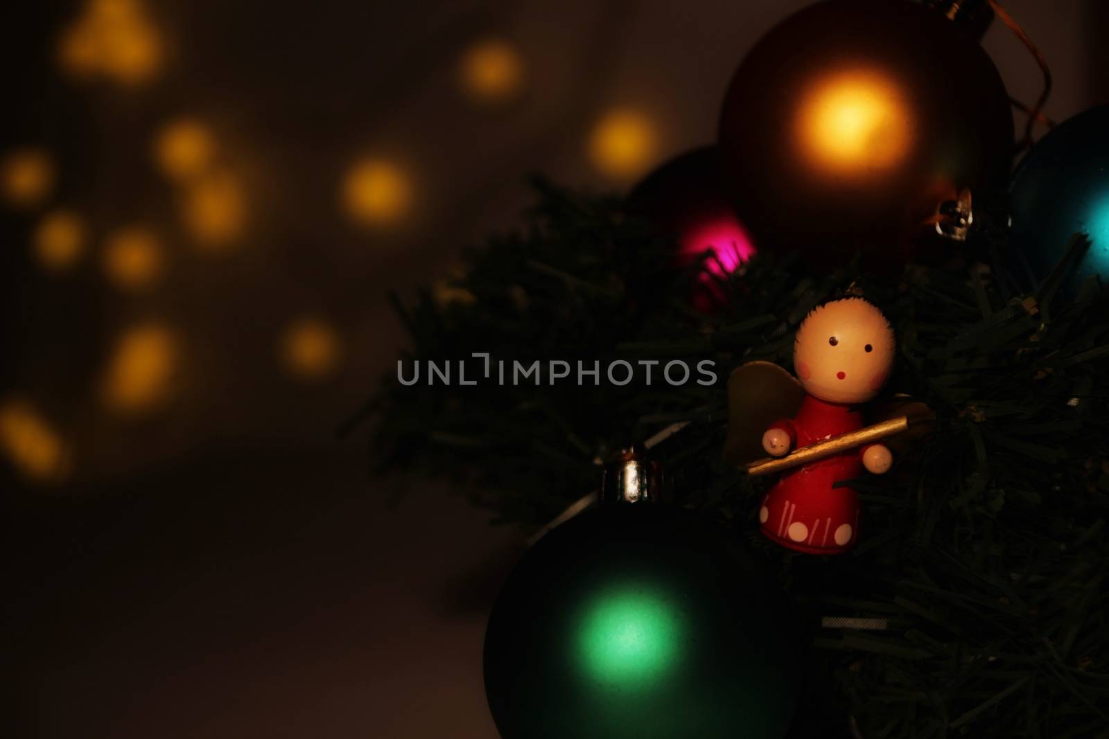 Angel Christmas ornament, Christmas tree balls, garlands and other colorful decorative elements