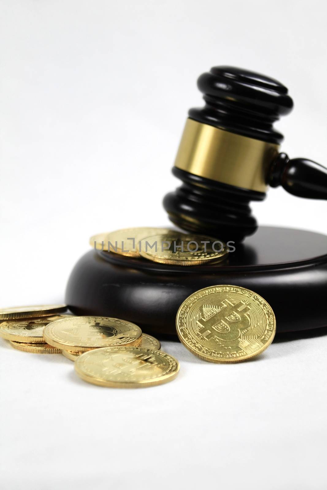 Golden bitcoins and judge gavel by soniabonet