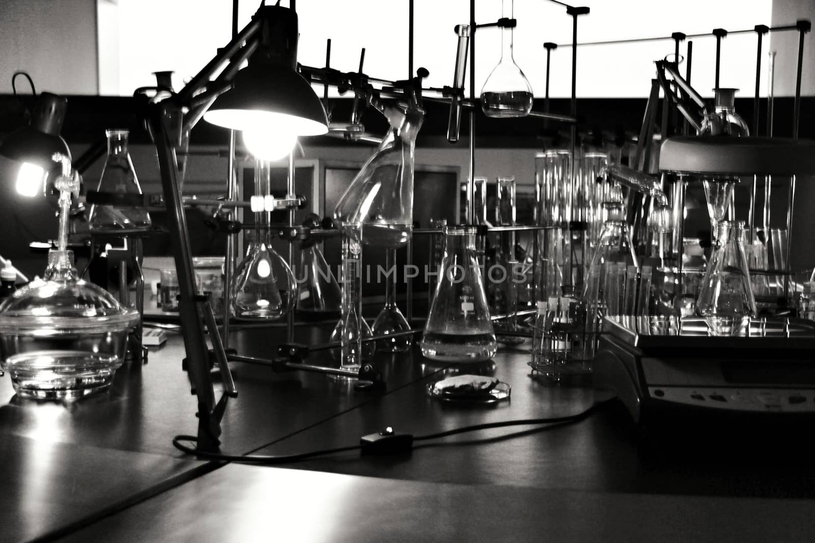 Glass test tubes and pots in a laboratory in Spain