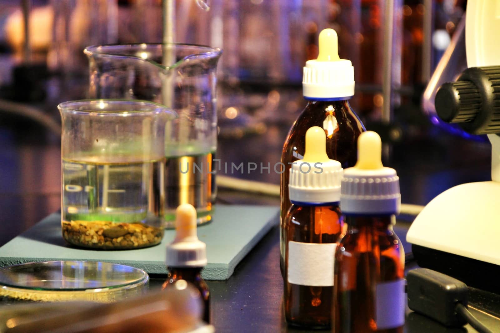Test tubes and pots in a laboratory in Spain by soniabonet