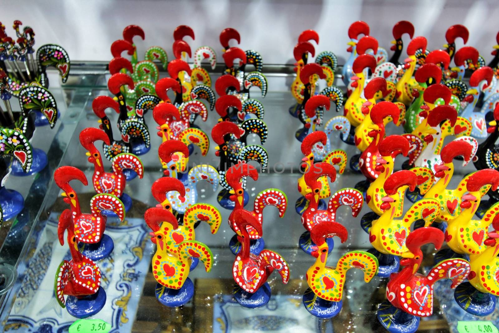 Colorful rooster souvenirs of Porto city by soniabonet