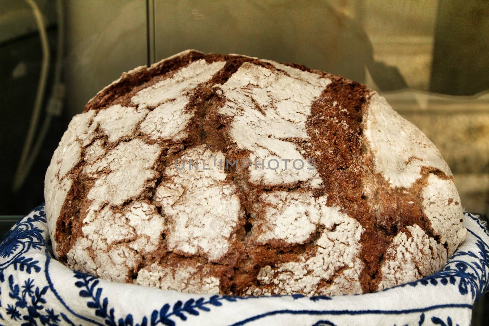 Tasty loaf of bread in a bakery showcase in Spain