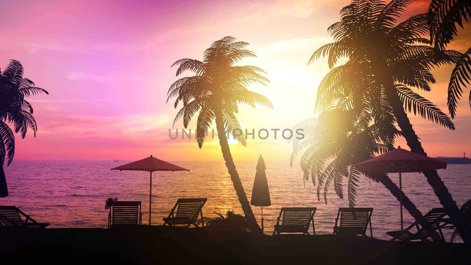 Resort area with palm trees during bright sunset.