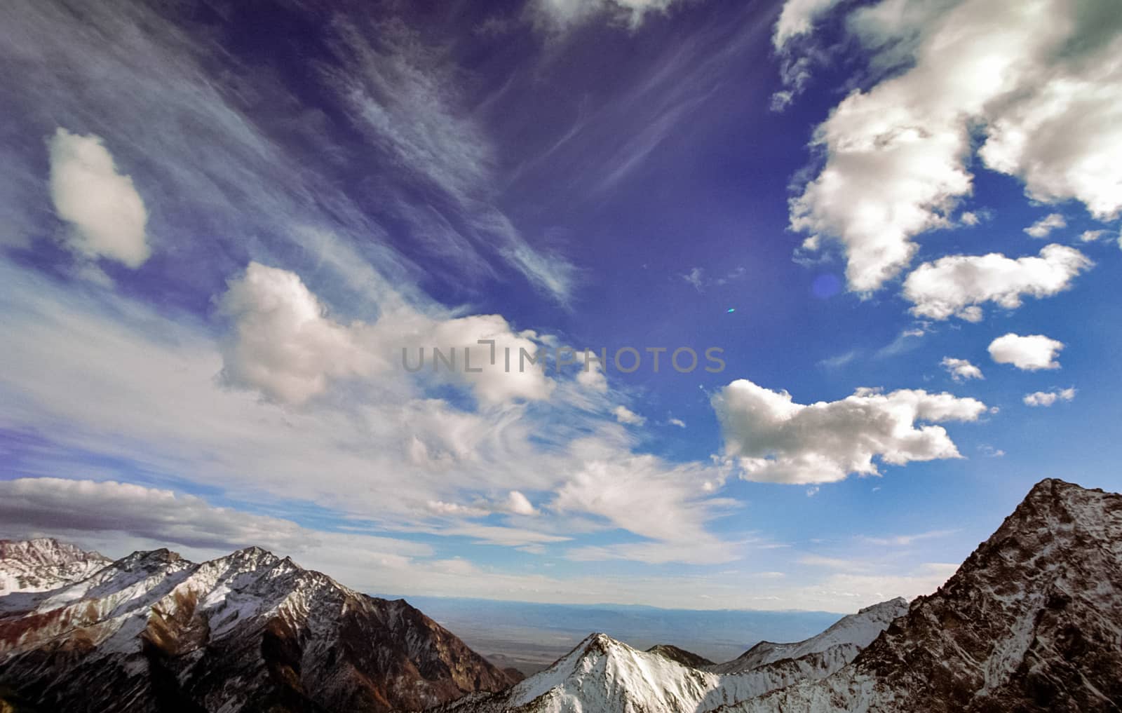 Mount Sayan in winter in the snow. The nature of the mountains is sayan.