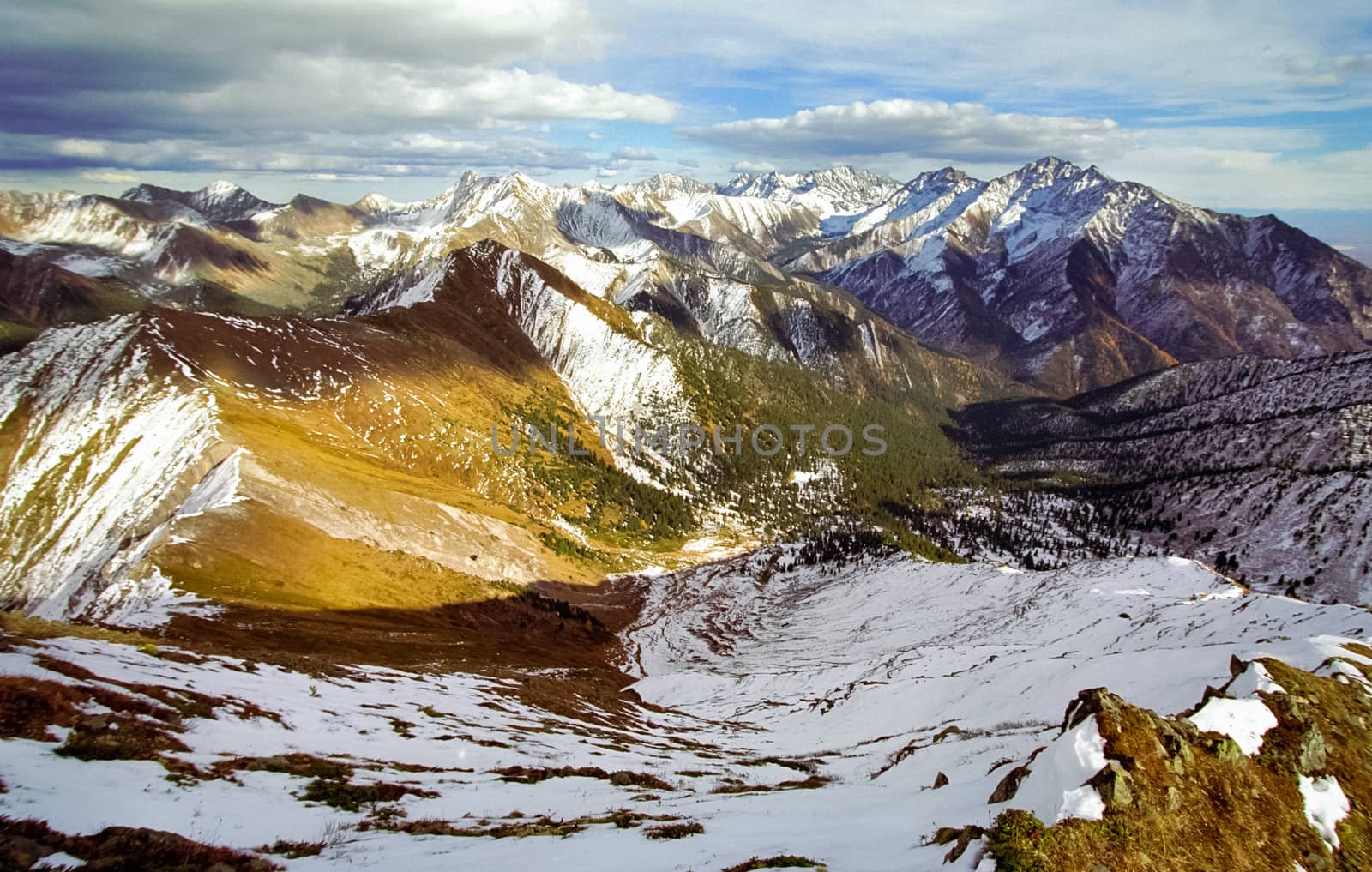 Mount Sayan in winter in the snow. The nature of the mountains is sayan.