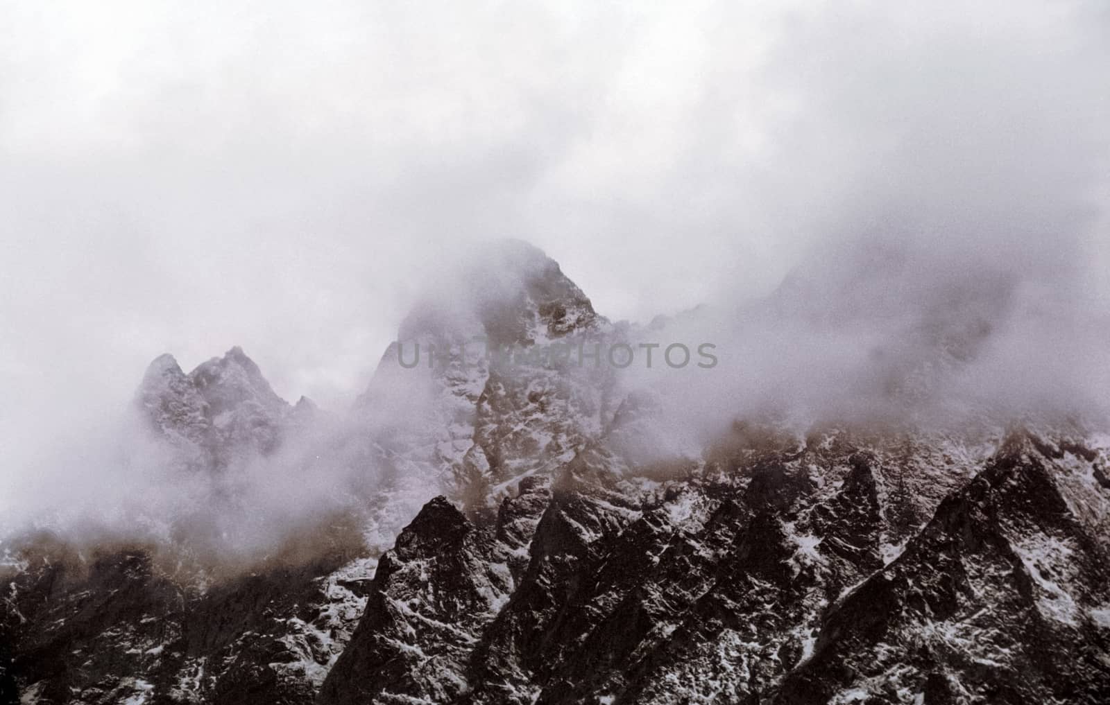 Mount Sayan in winter in the snow. The nature of the mountains is sayan.