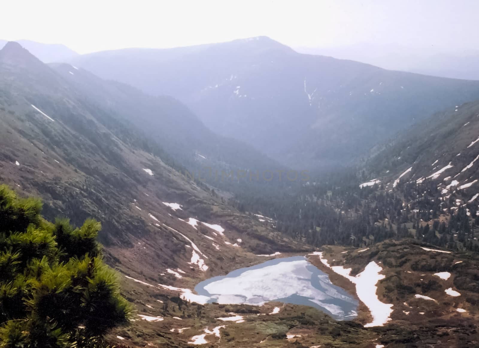 Mount Sayan in winter in the snow. The nature of the mountains is sayan.