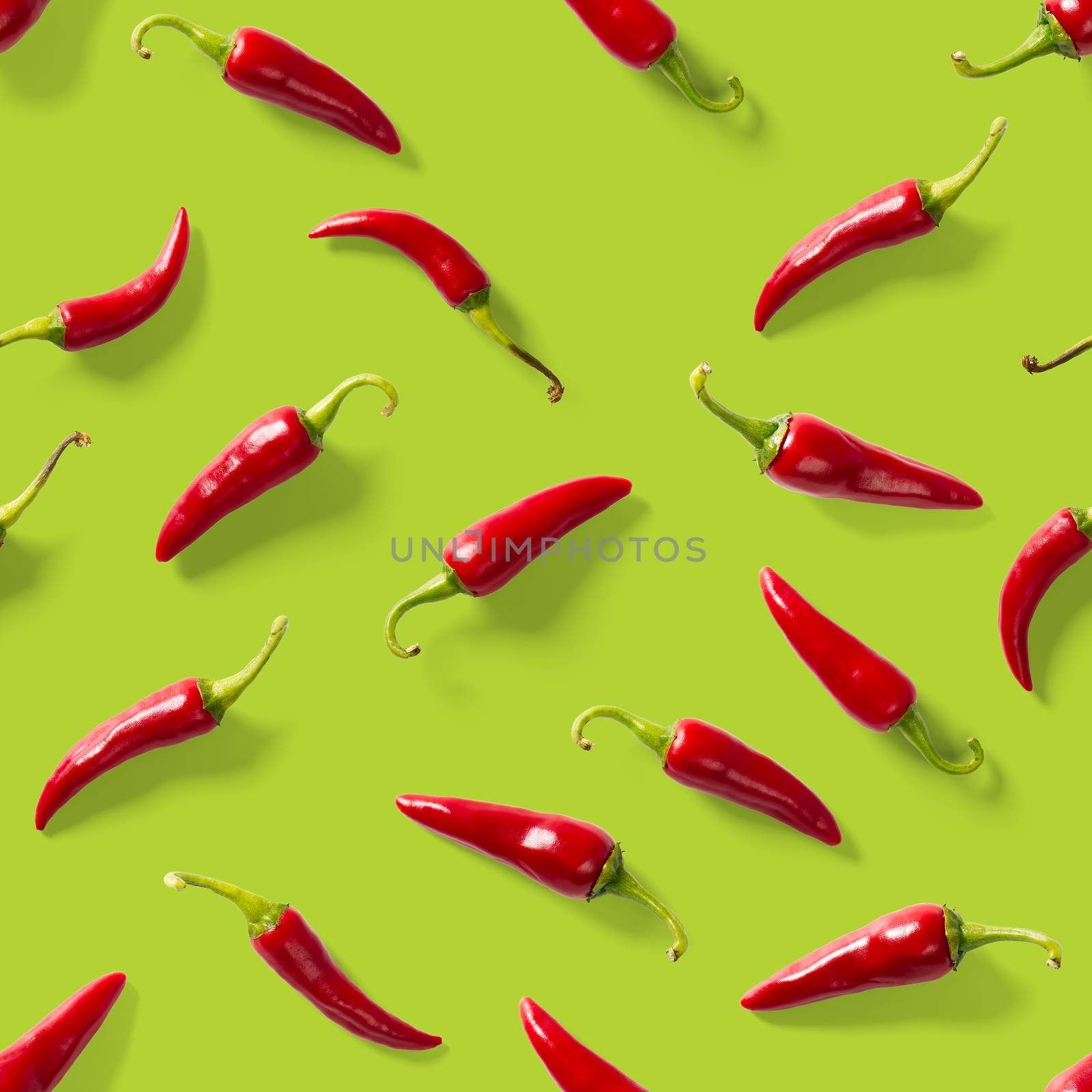 Red hot chilli seamless peppers pattern. Seamless pattern made of red chili or chilli on green background. Minimal food pattern. Food background.