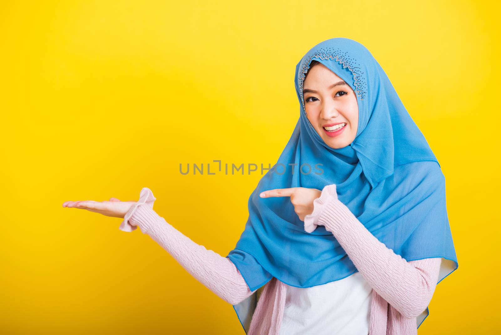 Asian Muslim Arab woman Islam wear hijab smile she positive expr by Sorapop