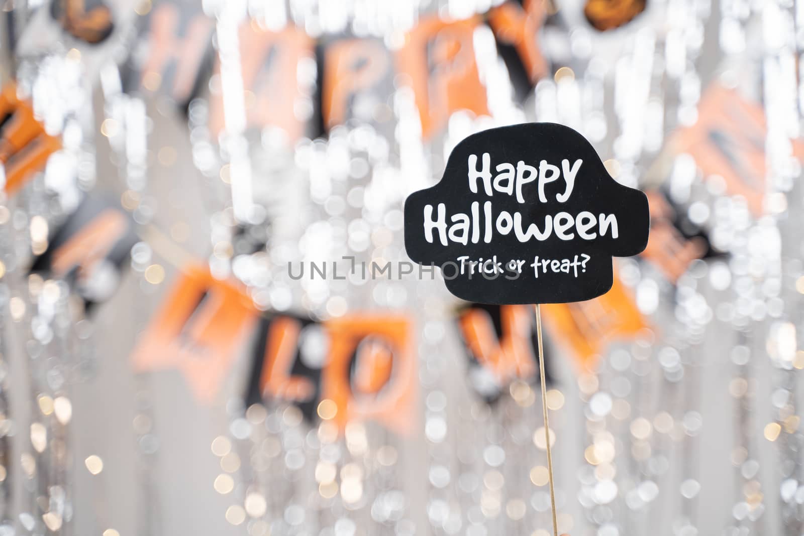 Happy Halloween and trick or treat signage booth prop on decorated background - concept of holiday and halloween festival. by lakshmiprasad.maski@gmai.com