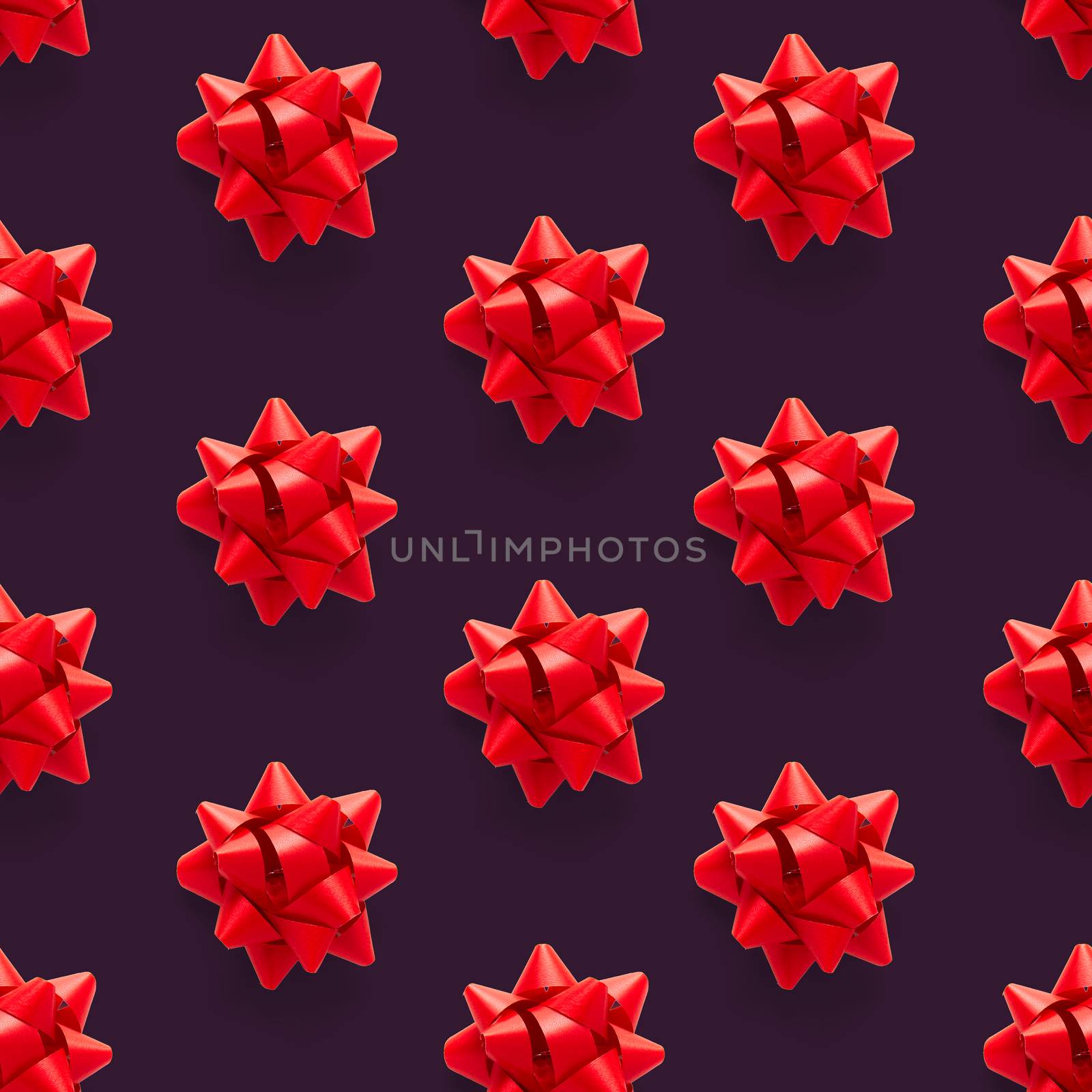 Seamless regular creative Christmas pattern with New Year decorations on purple background. xmas Modern Seamless pattern made from christmas decorations. Photo quality pattern for fabric, prints, wallpapers, banners or creative design works.