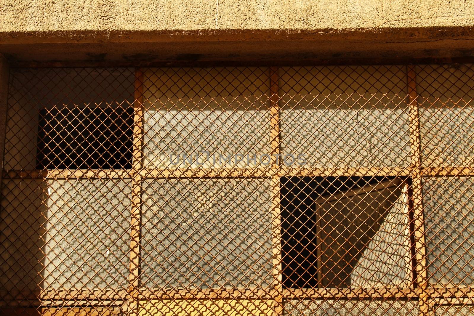 Window with metalized abstract and symmetrical grid texture