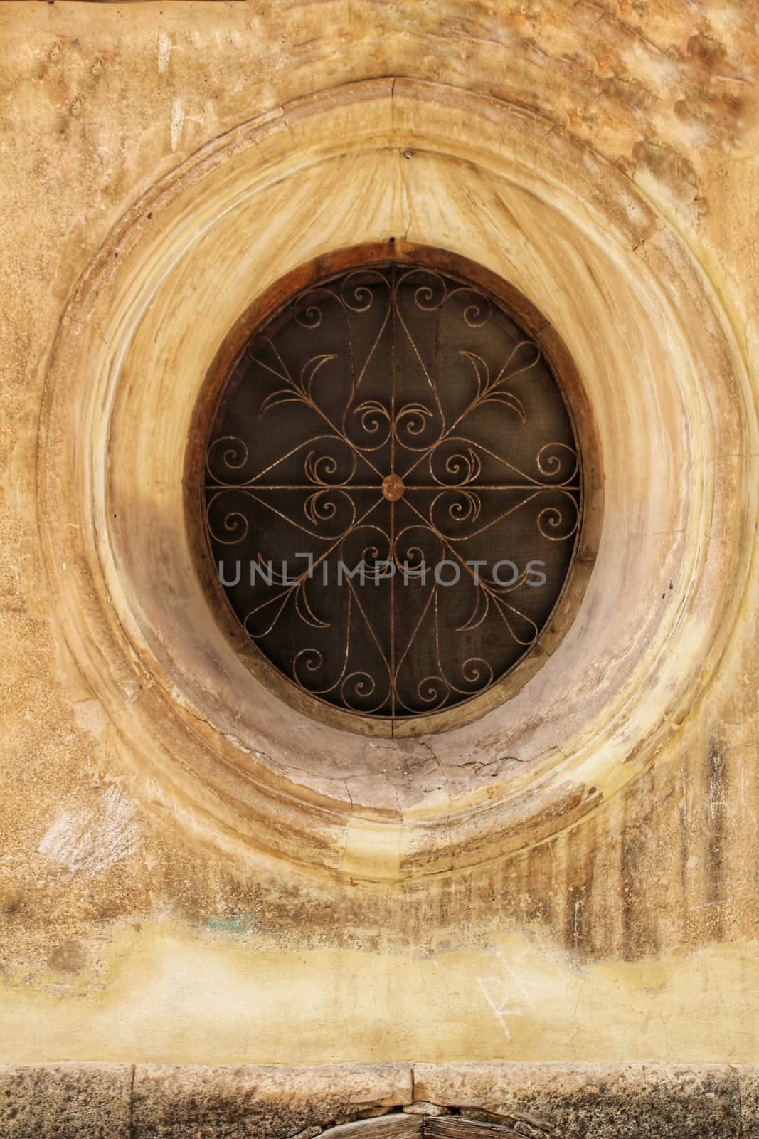 Old stone rosette with forged metal details, Castile-La Mancha, Spain
