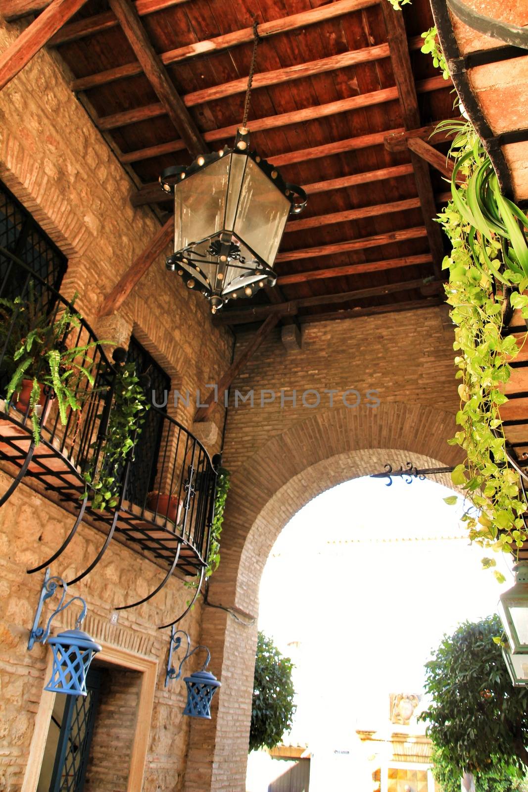 Narrow streets and majestic facades in Cordoba city, Spain.