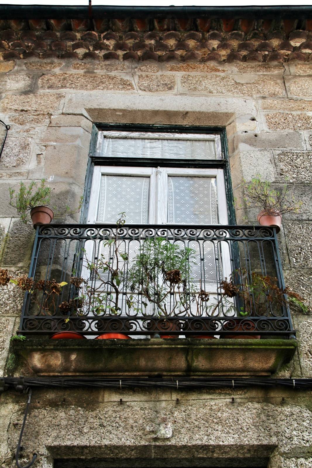 Beautiful streets and old stone facades of the portuguese medieval village of Guimaraes at Christmas