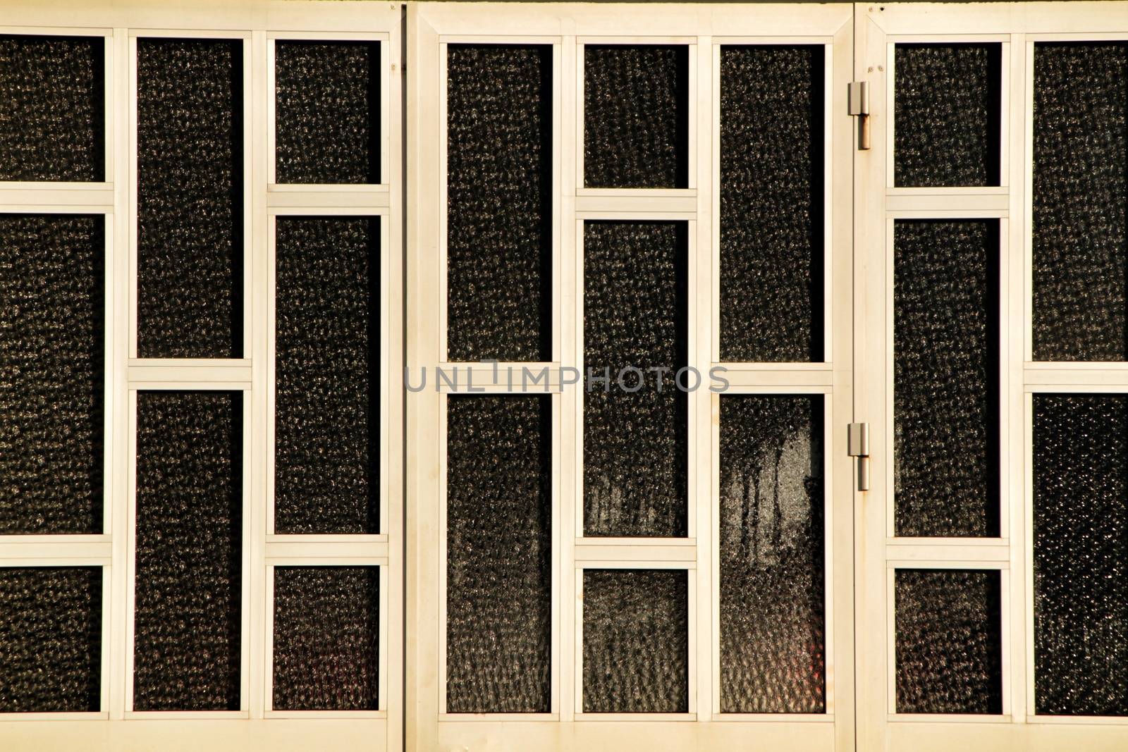 Glass door with metal forming rectangles in Porto, Portugal