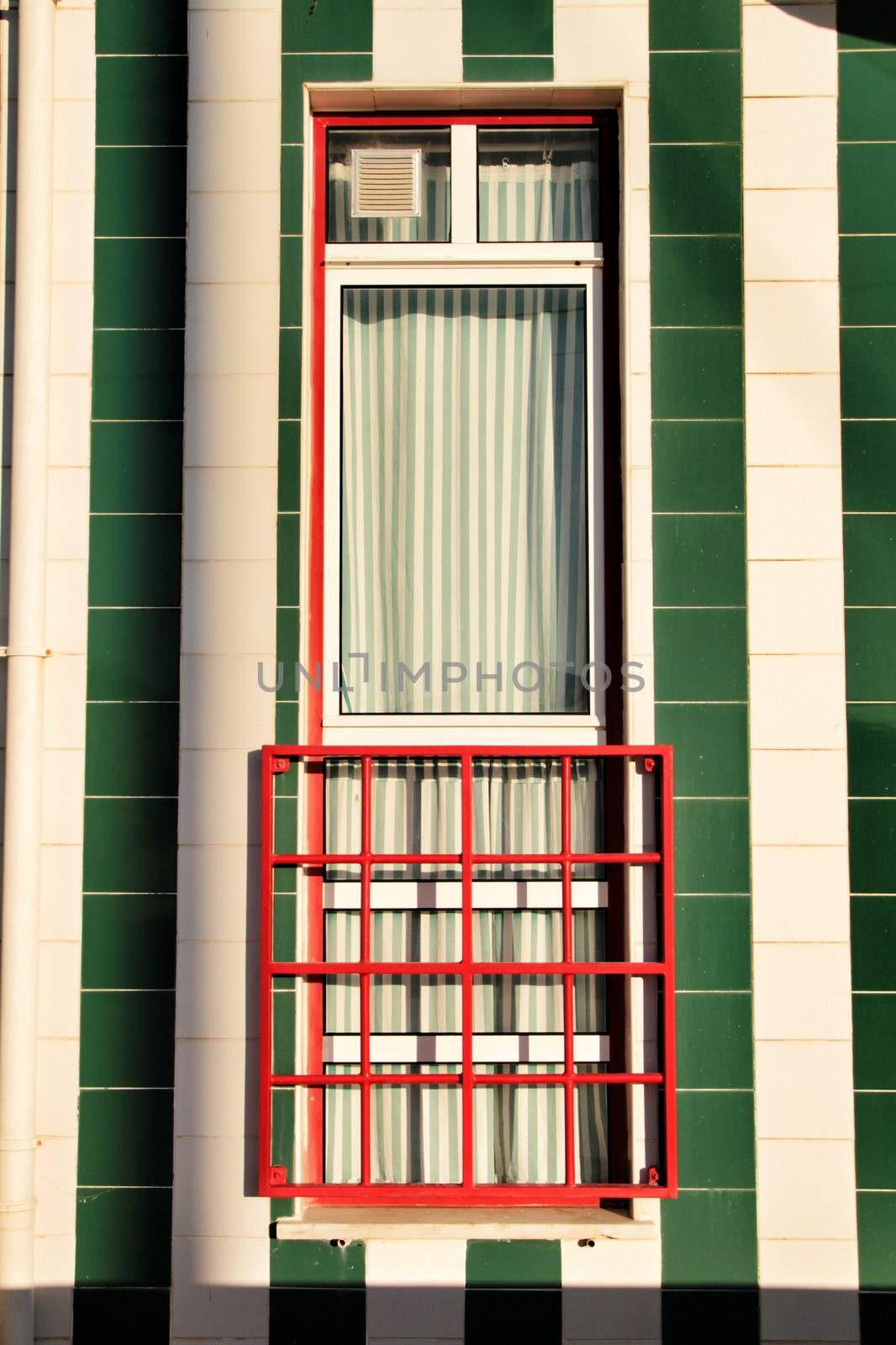 Striped and colorful facades in Costa Nova by soniabonet