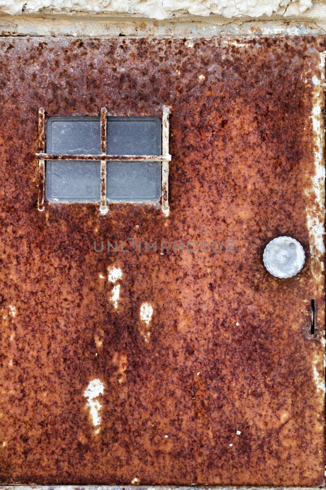 Colorful texture of old paint on rusty metal light box