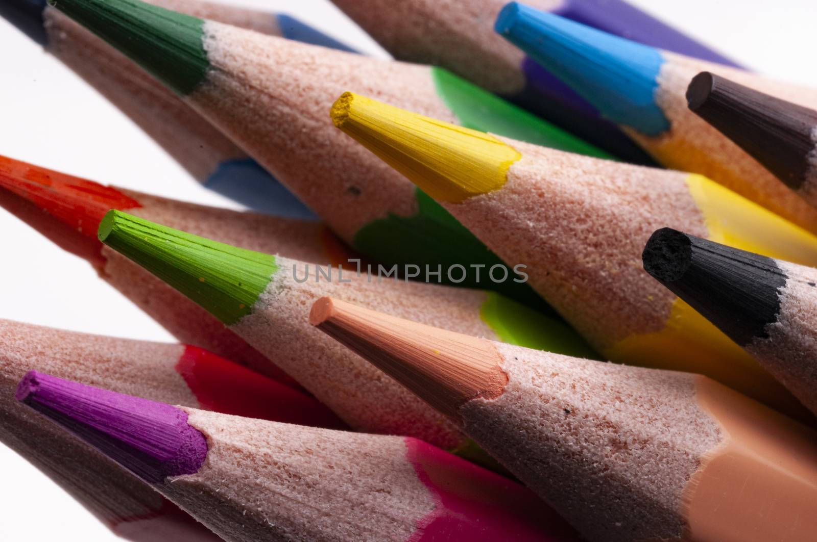 A group of colored pencils in diagonal macro view
