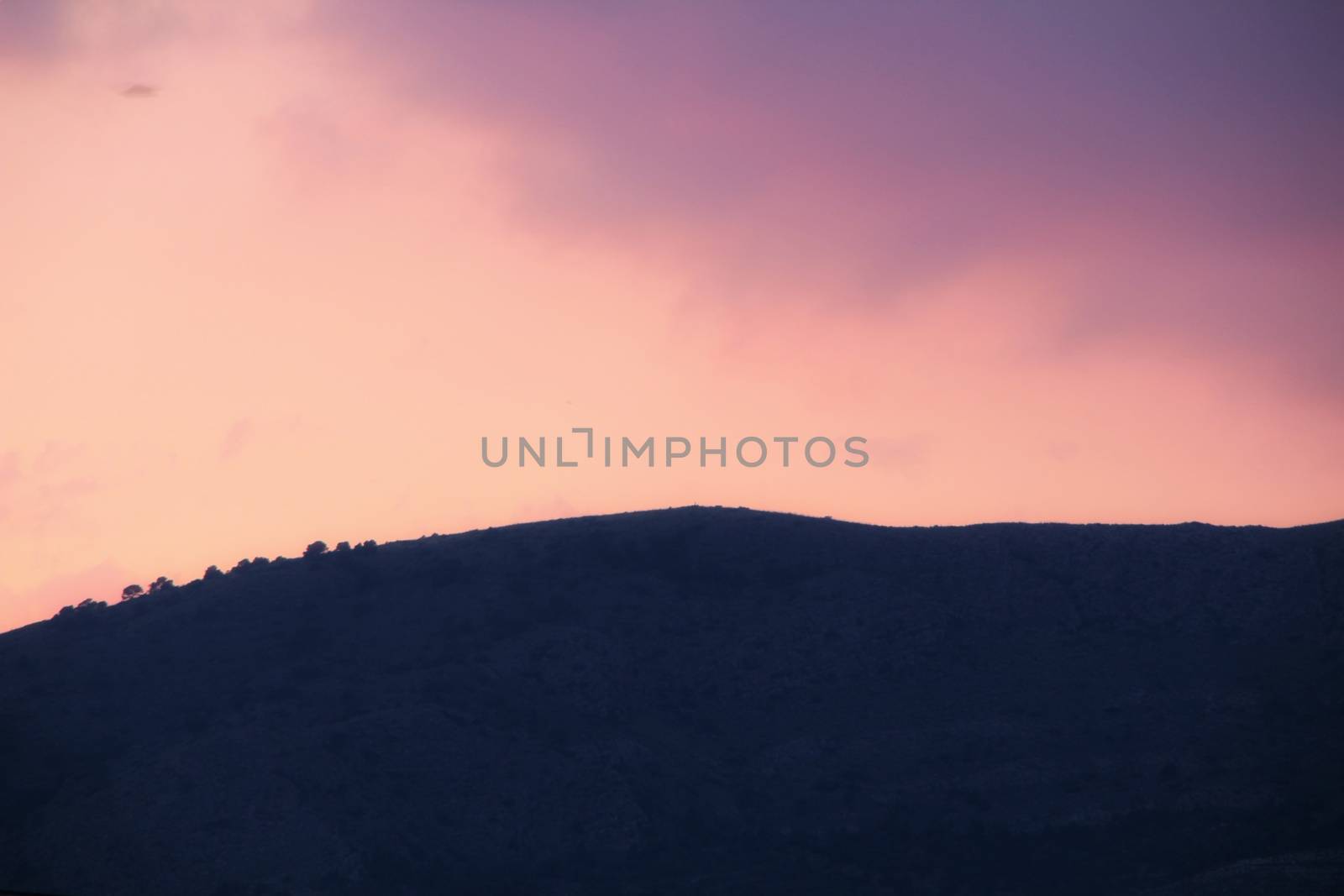 Beautiful purple and pink sky at sunset in Spain