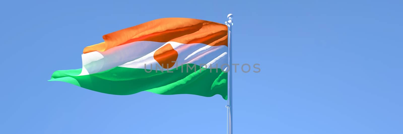 3D rendering of the national flag of Niger waving in the wind against a blue sky