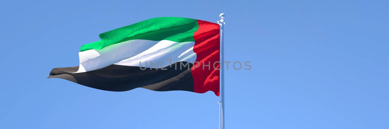 3D rendering of the national flag of UAE waving in the wind against a blue sky