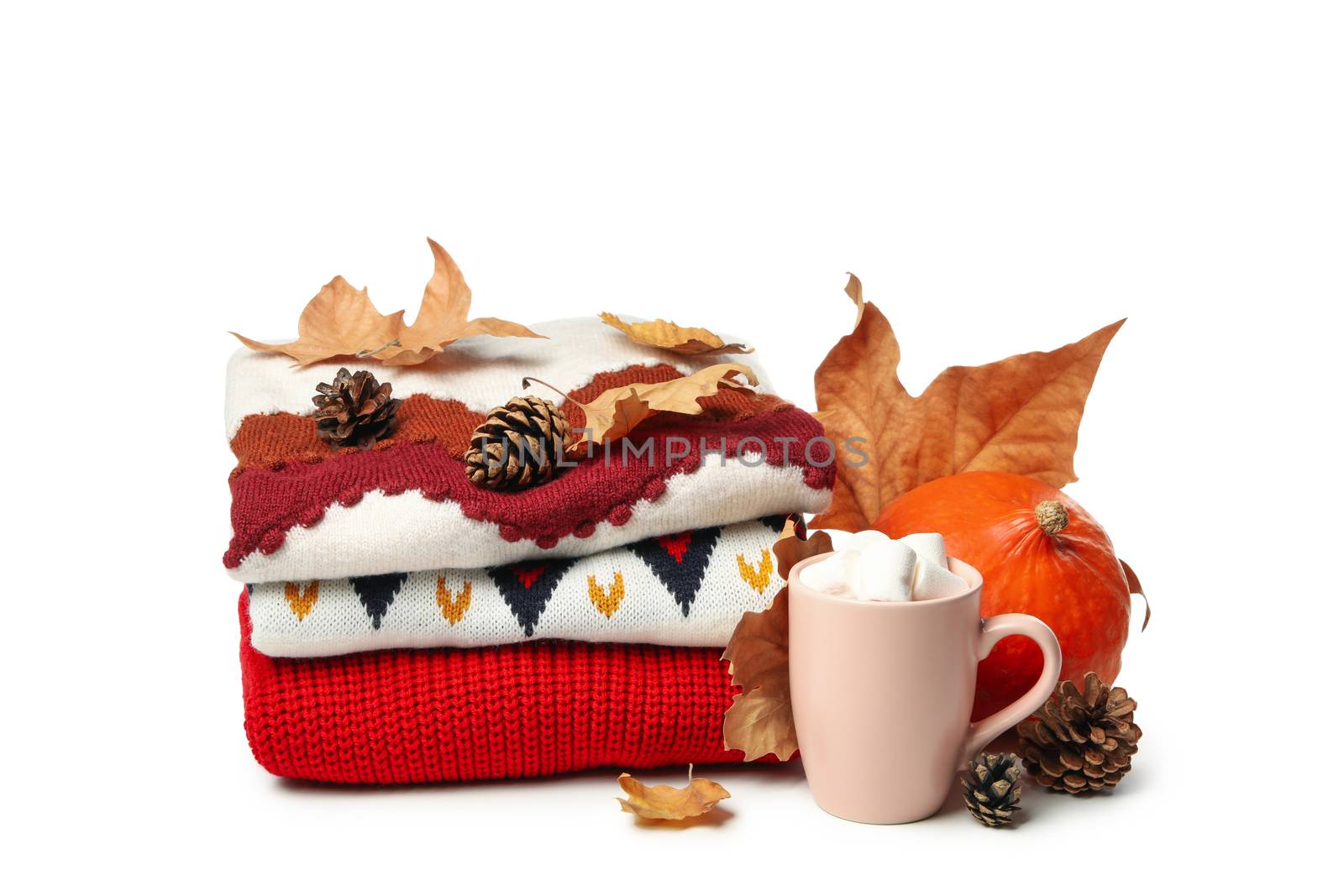 Autumn concept with sweater and cup of coffee isolated on white  by AtlasCompany