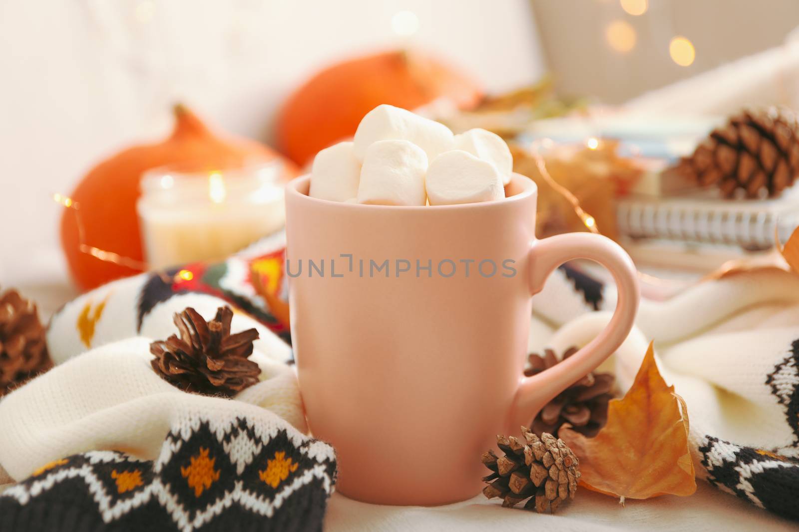 Autumn concept with cup of coffee with marshmallow and sweater by AtlasCompany