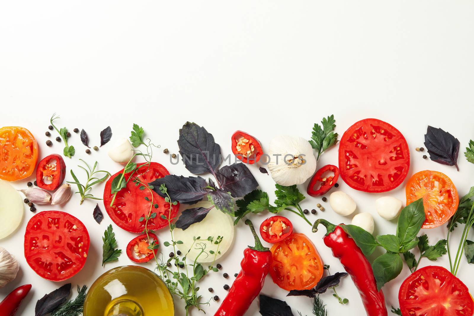 Different herbs and spices on white background, top view