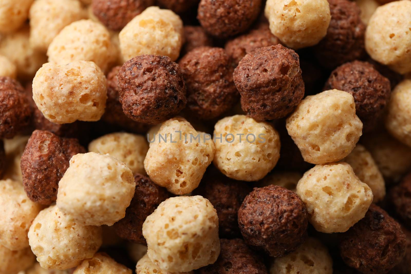 Tasty corn balls on whole background, close up