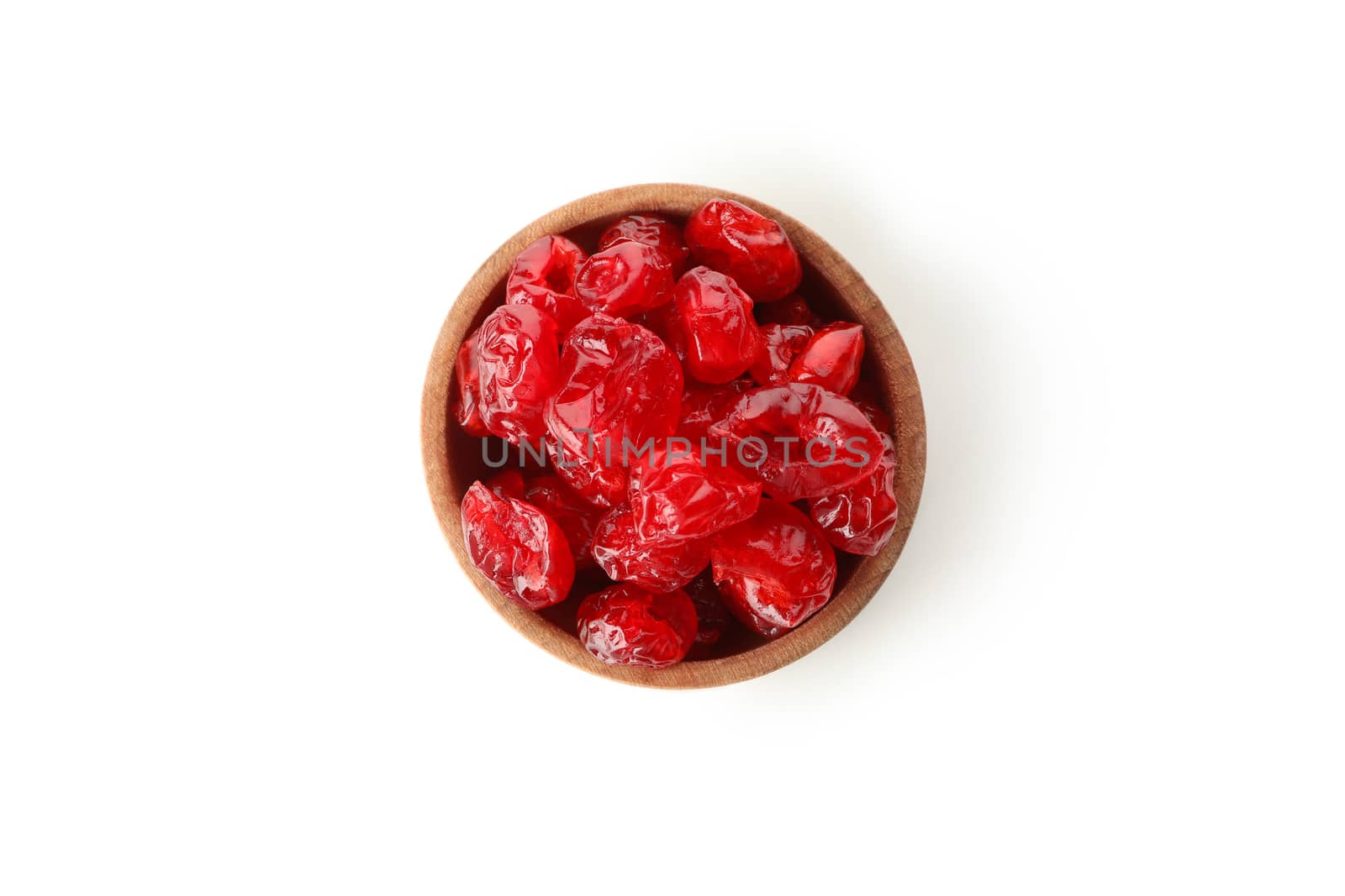 Bowl with dried cherry isolated on white background