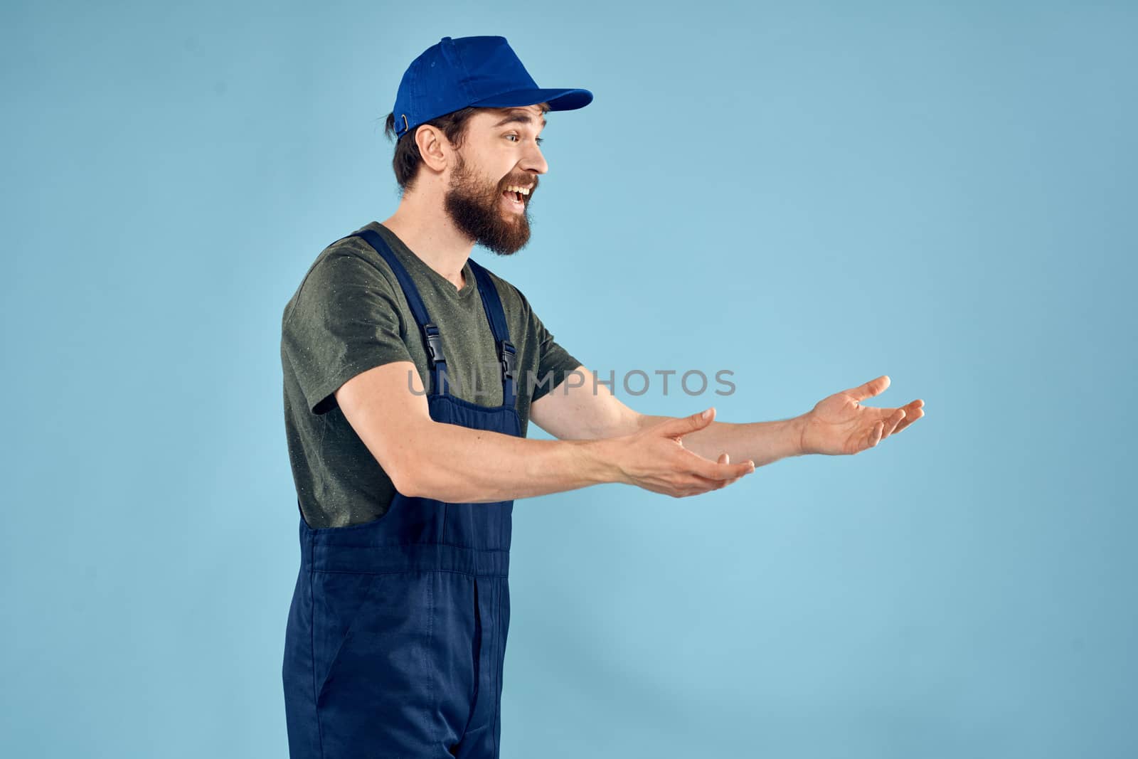 Man in working uniform emotions in life delivery service work. High quality photo