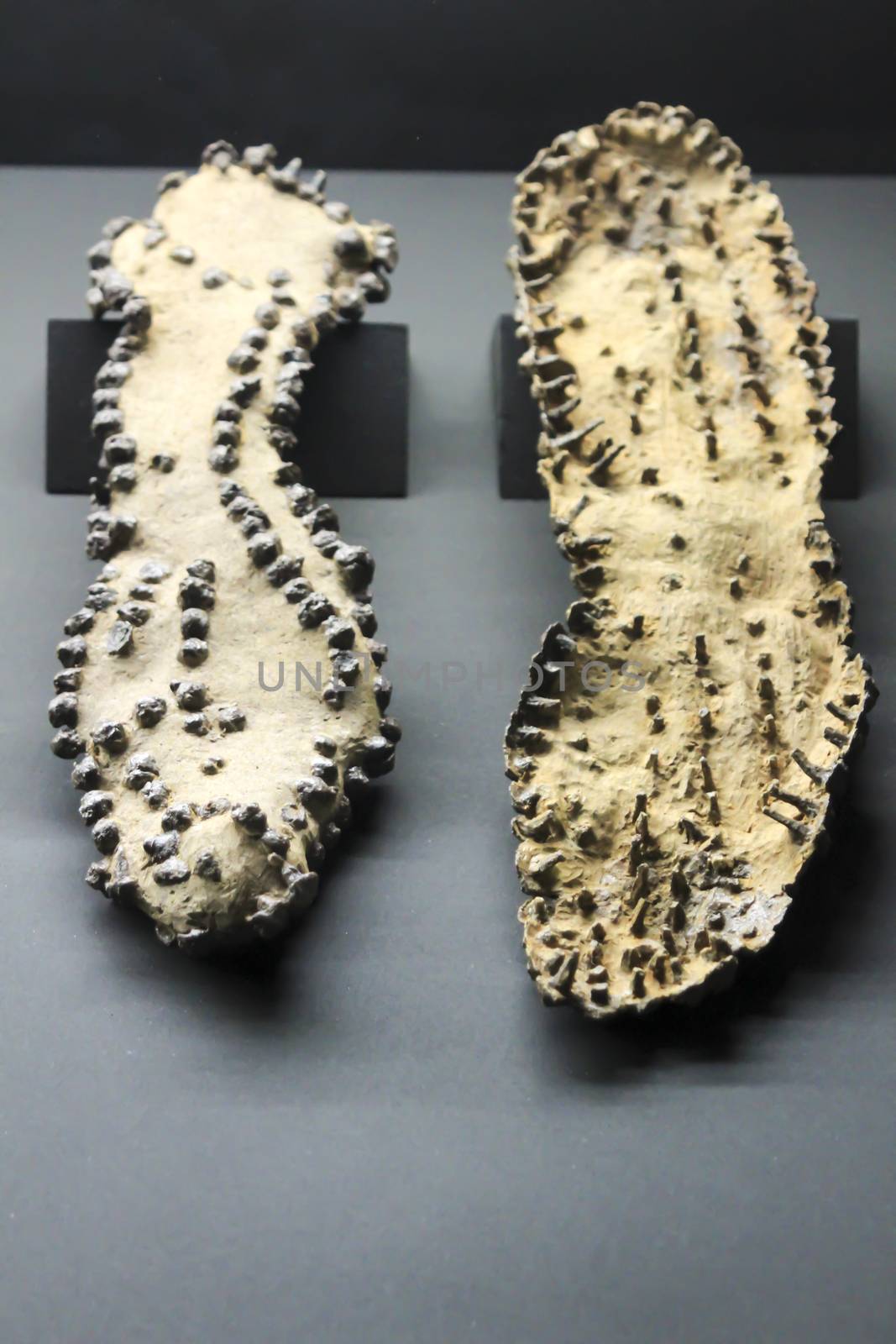 Alicante, Spain- October 8, 2020: Pair of Roman sandal soles of the 4th century found at the Albir necropolis and exhibited at the Archaeological Museum of Alicante
