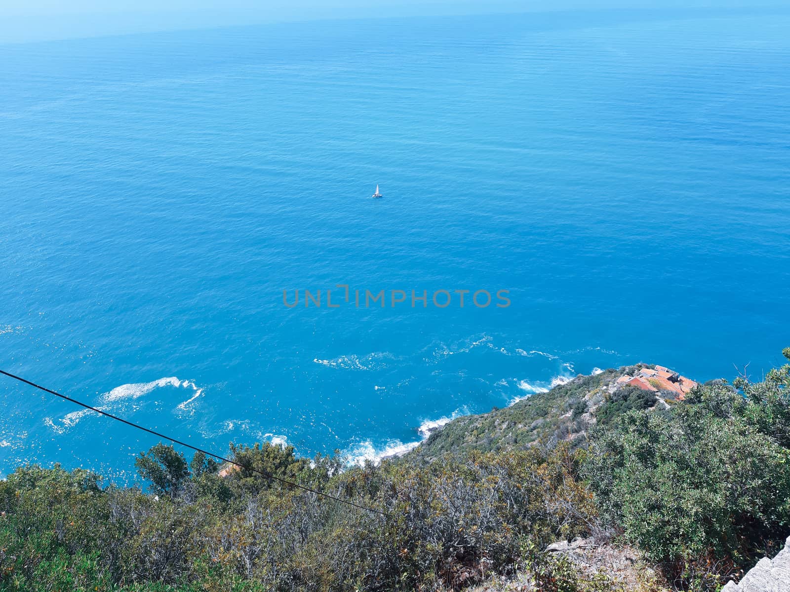 Cinque Terre, Italy - 09/02/2020: Beautiful landscape of a coastal fishing village, amazing view on many little colorful houses, traditional architecture of the little Italian town called Cinque Terre