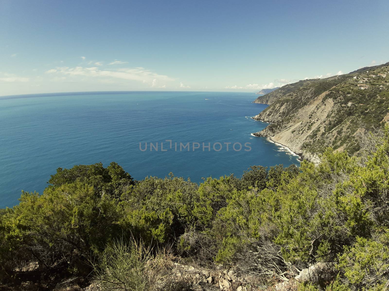 Cinque Terre, Italy - 09/02/2020: Beautiful landscape of a coastal fishing village, amazing view on many little colorful houses, traditional architecture of the little Italian town called Cinque Terre