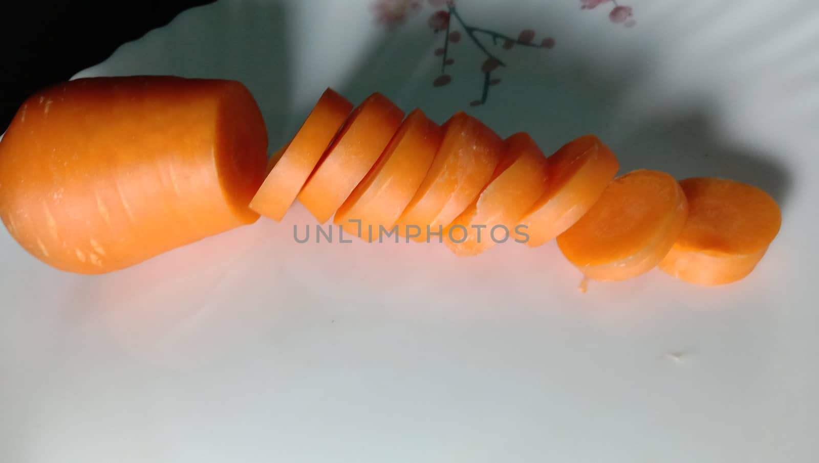 Fresh and delicious and healthy carrots on the plate